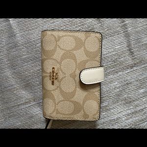 Coach corner zip wallet